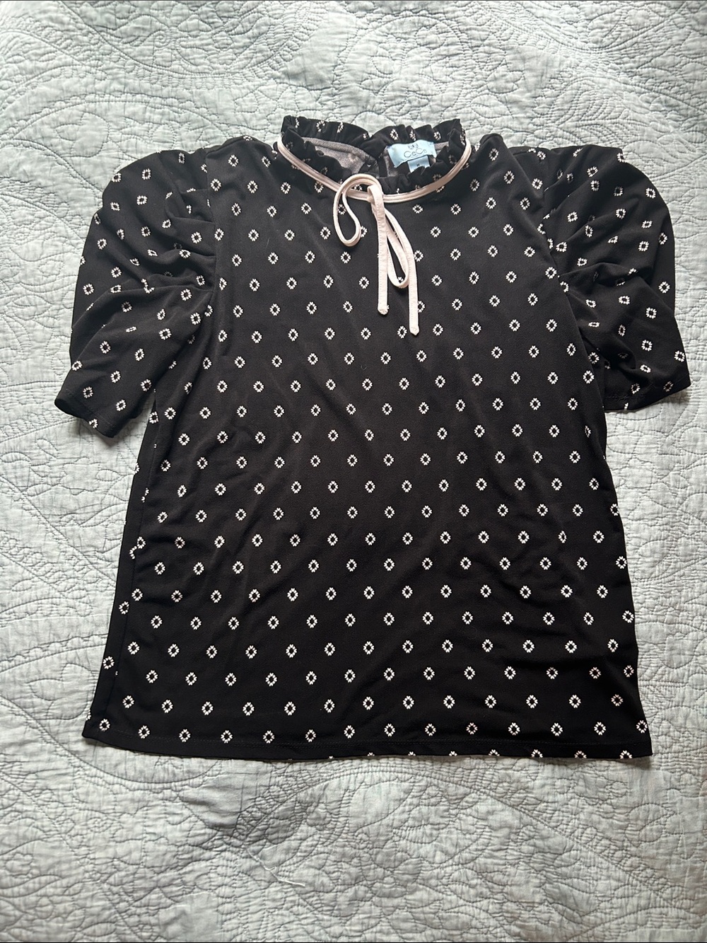 CeCe Black Top with White Diamond Print and Ruffle Tie Neck M